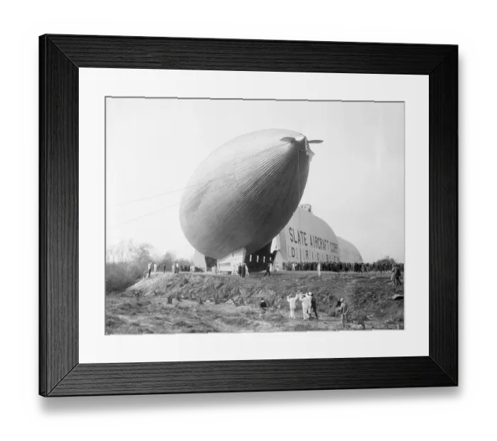 Framed Print : Dirigible Emerging from Its Hangar Framed Print : Dirigible Emerging from Its Hangar