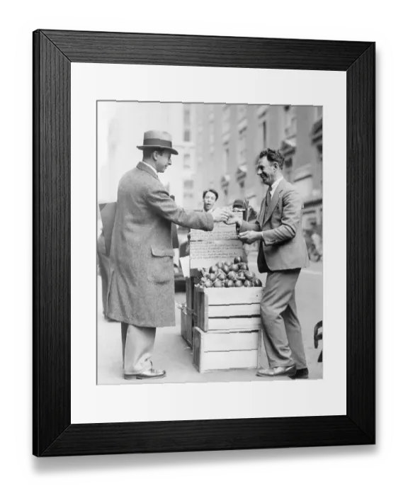 Framed Print : Man Buying an Apple from Man Framed Print : Man Buying an Apple from Man