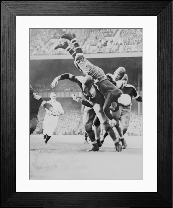 Framed Print : Jack McBride Upended During Football Game Framed Print : Jack McBride Upended During Football Game