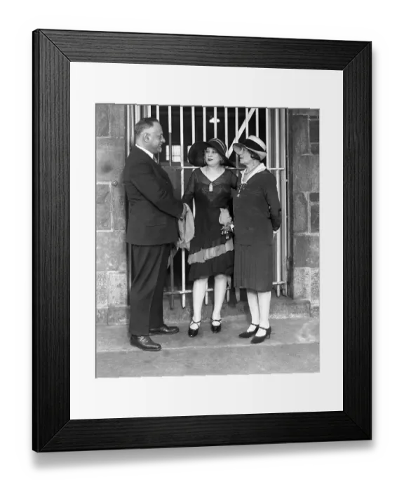 Framed Print : Mae West is seen here being welcomed back to Blackwell's Island jail