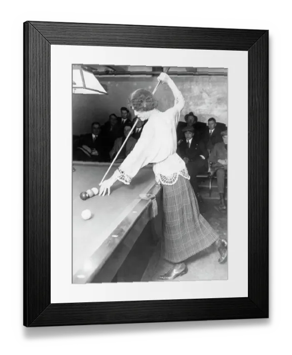 Framed Print : Man dressed as woman aiming cue at pool table Framed Print : Man dressed as woman aiming cue at pool table