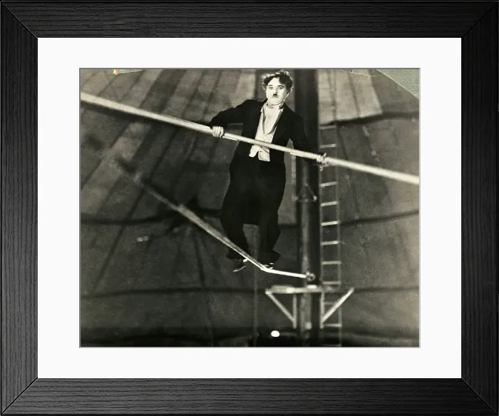 Framed Print : Charlie Chaplin on a Tightrope Framed Print : Charlie Chaplin on a Tightrope