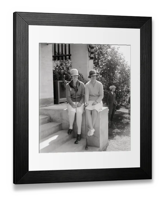 Framed Print : Two female golf players on porch, 1928 Framed Print : Two female golf players on porch, 1928