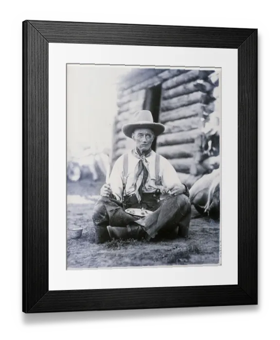 Framed Print : Cowboy Seated Indian Style Eating Framed Print : Cowboy Seated Indian Style Eating