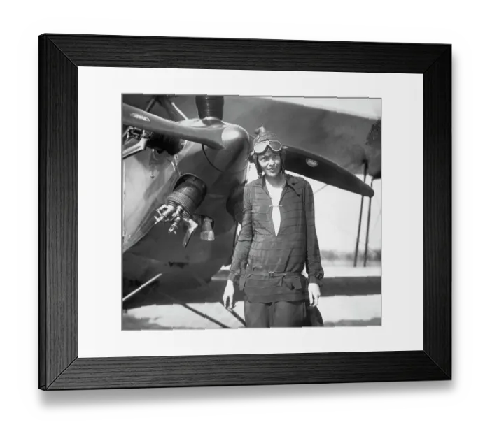 Framed Print : Amelia Earhart Stands In Front of Plane Framed Print : Amelia Earhart Stands In Front of Plane