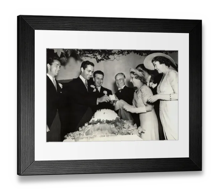 Framed Print : Mary Pickford and Buddy Rogers Cutting Wedding Cake