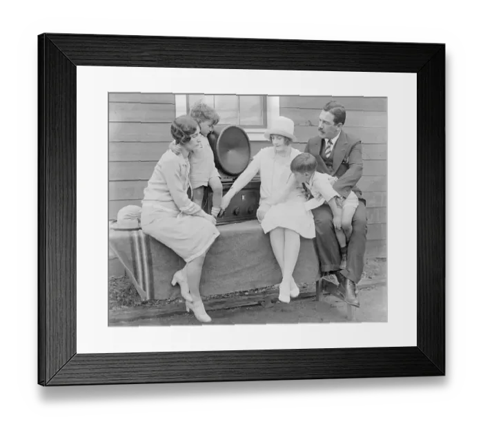 Framed Print : Family Members Listening to Radio Framed Print : Family Members Listening to Radio