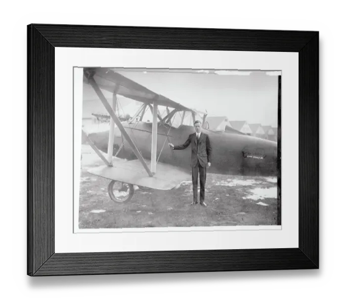 Framed Print : Charles Lindbergh Standing Next to Airplane Framed Print : Charles Lindbergh Standing Next to Airplane