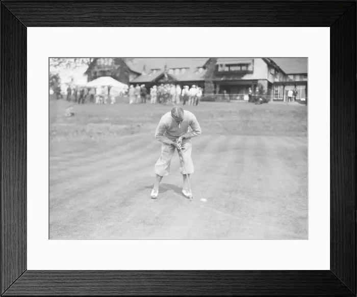 Framed Print : Golfer Putting in Awkward Stance Framed Print : Golfer Putting in Awkward Stance