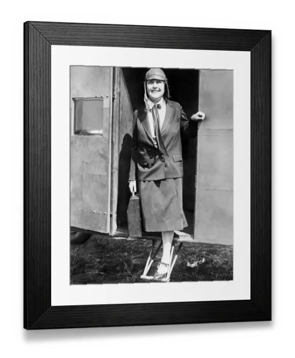 Framed Print : Woman Journalist Stepping Off Zeppelin Framed Print : Woman Journalist Stepping Off Zeppelin