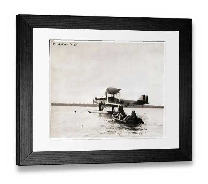 Framed Print : Naval Seaplane Loading Mail and Flood Aid