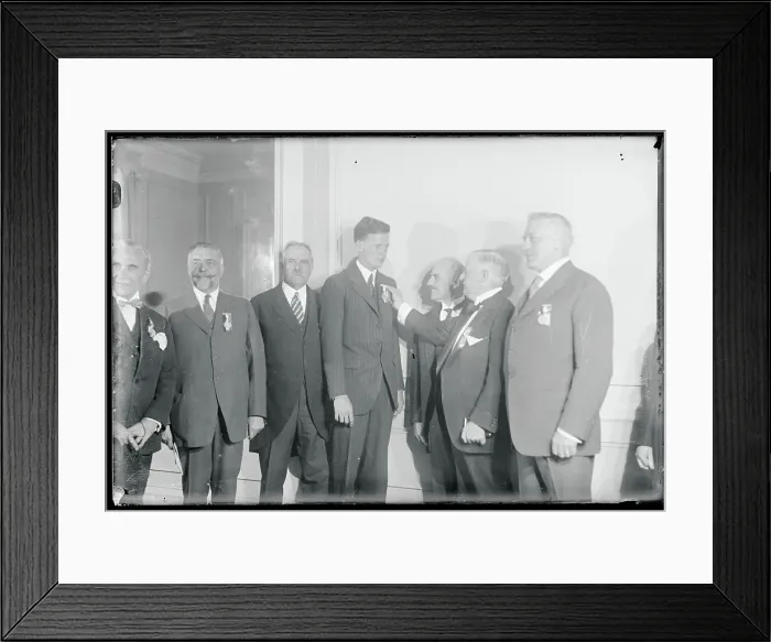 Framed Print : Charles Lindbergh Being Pinned by Governmental Official Framed Print : Charles Lindbergh Being Pinned by Governmental Official