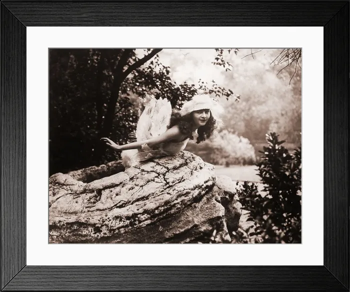 Framed Print : Woman Dressed As Bird In Nest Framed Print : Woman Dressed As Bird In Nest