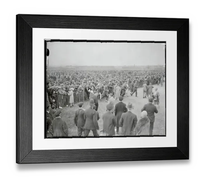 Framed Print : Large Crowd Standing at Fence Barrier Framed Print : Large Crowd Standing at Fence Barrier