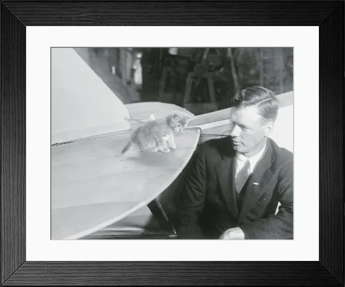 Framed Print : Charles Lindbergh with Kitten Mascot Framed Print : Charles Lindbergh with Kitten Mascot