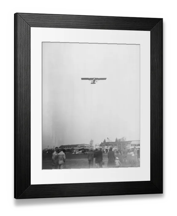 Framed Print : Airplane Being Observed Over Airfield Framed Print : Airplane Being Observed Over Airfield