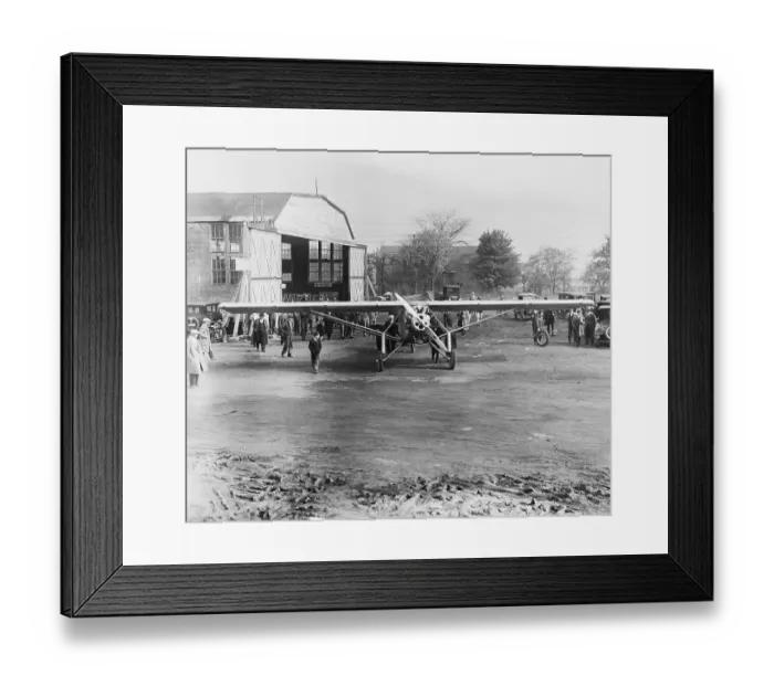 Framed Print : View of Airplane and Flight Staff on Field