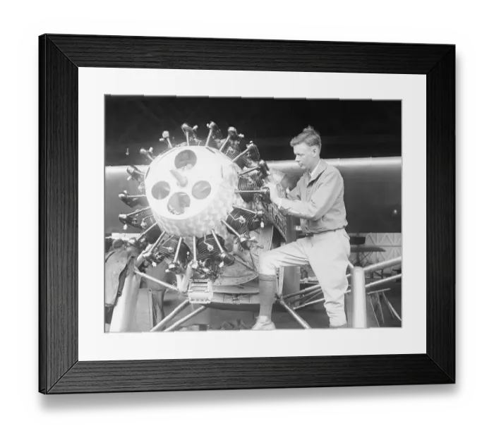 Framed Print : Aviator Charles Lindbergh Working on Airplane Parts Framed Print : Aviator Charles Lindbergh Working on Airplane Parts