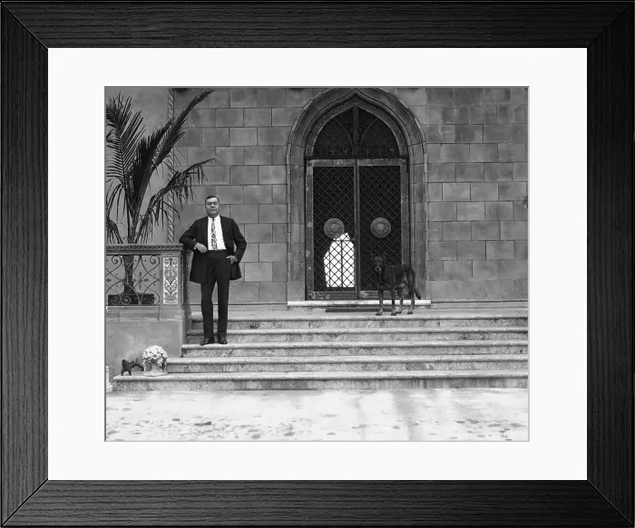 Framed Print : John Ringling on Steps with Dog at Home Framed Print : John Ringling on Steps with Dog at Home