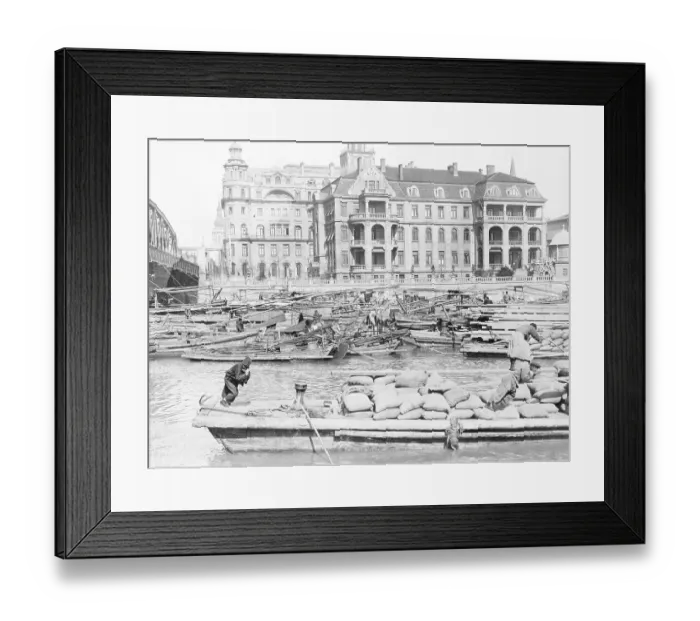 Framed Print : Boats Passing by Hotel