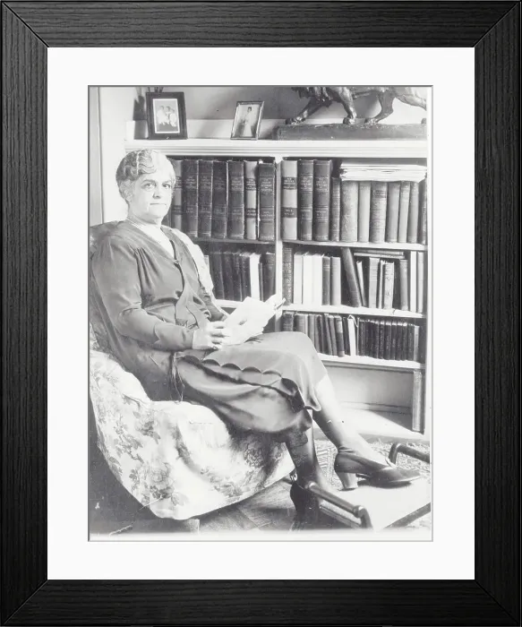 Framed Print : Emile Loring Reading Book in Chair Framed Print : Emile Loring Reading Book in Chair