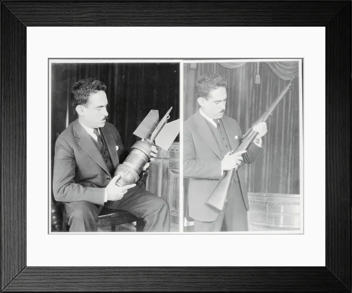 Framed Print : Enrique Estrada Examining Bomb and Rifle Framed Print : Enrique Estrada Examining Bomb and Rifle