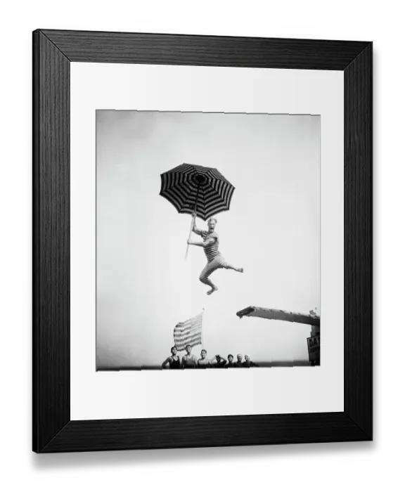 Framed Print : Olympic Swimmer Doing Comic Diving Stunt