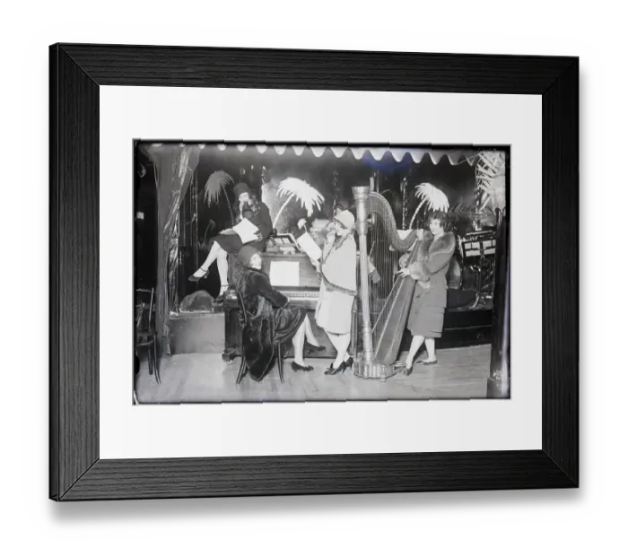 Framed Print : Girls Stand Around Piano In Nightclub Framed Print : Girls Stand Around Piano In Nightclub