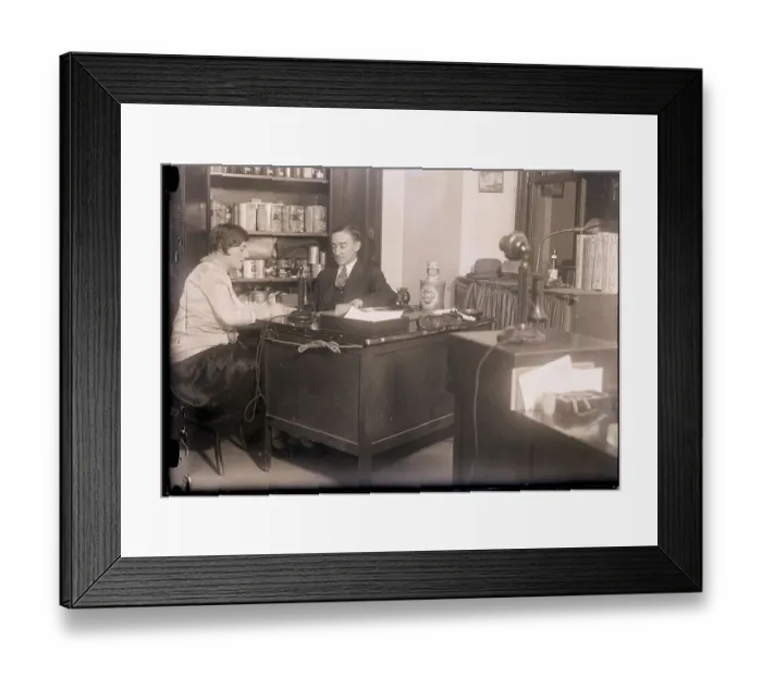 Framed Print : Boss Dictating to Secretary in Office Framed Print : Boss Dictating to Secretary in Office