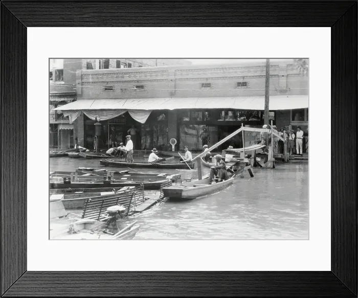 Framed Print : People Transporting Themselves by Boat Framed Print : People Transporting Themselves by Boat