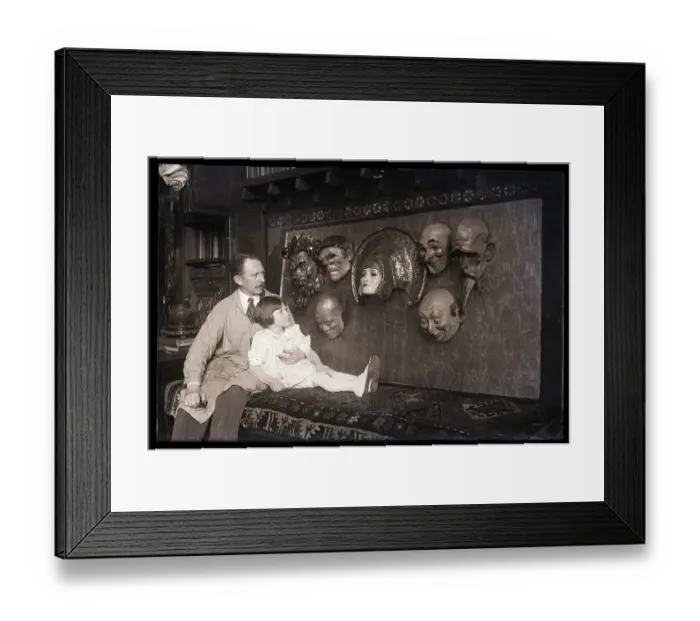 Framed Print : W.T. Benda with Daughter in Lap Looking at Masks Framed Print : W.T. Benda with Daughter in Lap Looking at Masks