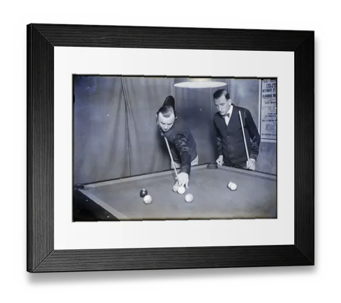 Framed Print : Pool Player Looks On While Shoots Framed Print : Pool Player Looks On While Shoots