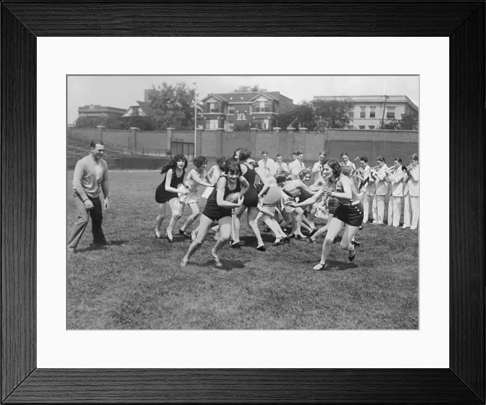 Framed Print : Red Grange Coaching a Girls Football team