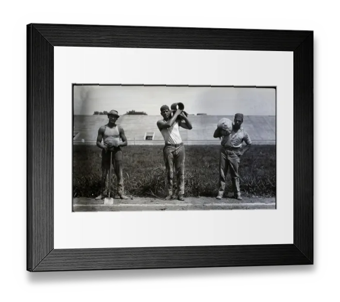 Framed Print : Gootbal Players Doing Construction Work
