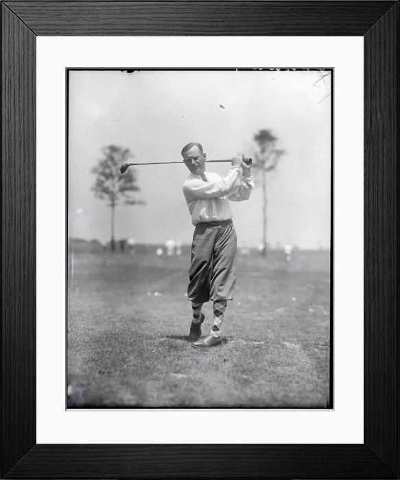 Framed Print : Golfer in Post-Swing Position