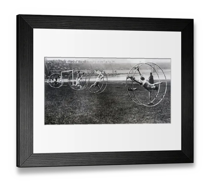 Framed Print : Men Participating in Cat-in-the-Wheel Race Framed Print : Men Participating in Cat-in-the-Wheel Race