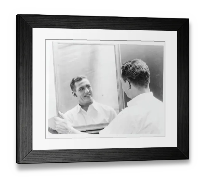 Framed Print : Harold Grange Looks in Mirror After Applying Makeup Framed Print : Harold Grange Looks in Mirror After Applying Makeup