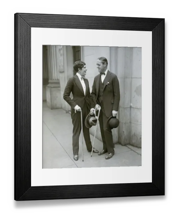 Framed Print : Woman Dressed Like Man Talks To Man Framed Print : Woman Dressed Like Man Talks To Man