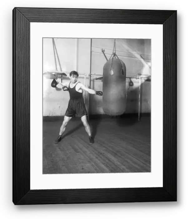 Framed Print : Boxer Georges Carpentier Working On Bag Framed Print : Boxer Georges Carpentier Working On Bag