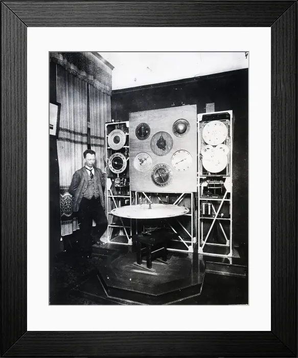 Framed Print : Man Standing Next to Detailed Clock Framed Print : Man Standing Next to Detailed Clock