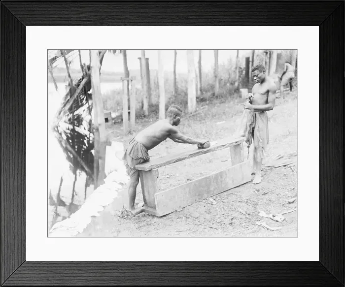 Framed Print : Rolling Rubber Into Cakes Framed Print : Rolling Rubber Into Cakes