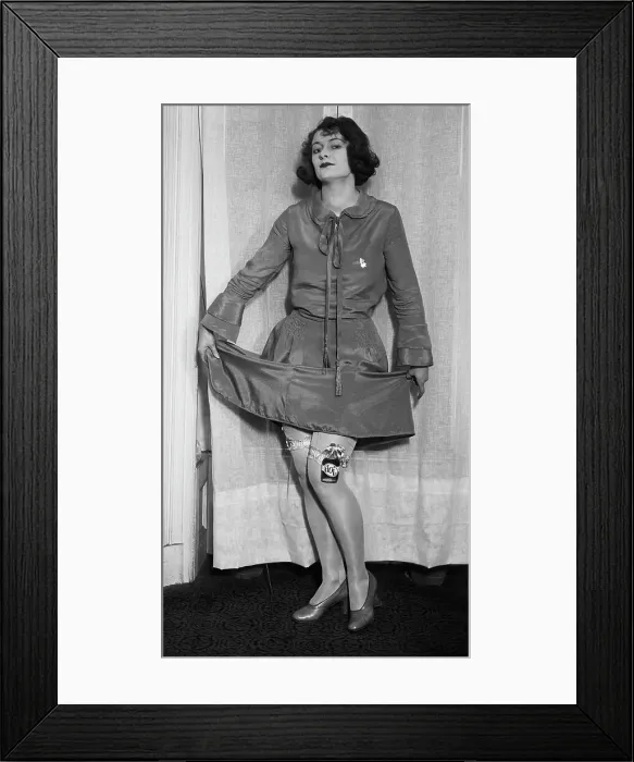 Framed Print : Woman Holding up Dress with Garter Flask Framed Print : Woman Holding up Dress with Garter Flask