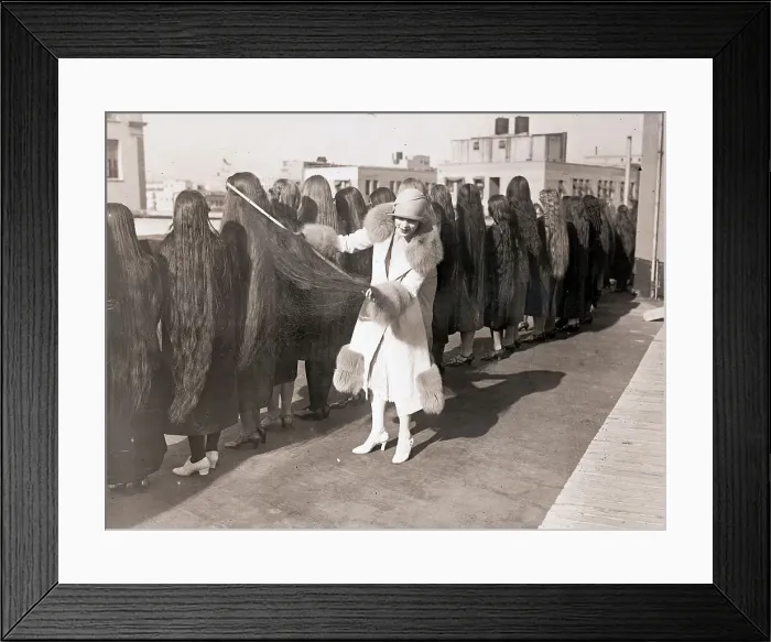 Framed Print : Woman Measuring Long Hair In Contest Framed Print : Woman Measuring Long Hair In Contest
