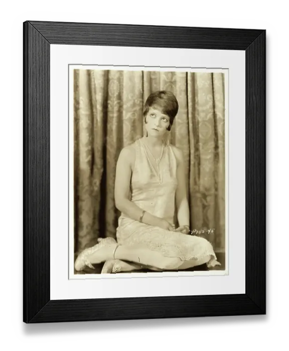 Framed Print : Clara Bow Star Posing in Front of Curtains Framed Print : Clara Bow Star Posing in Front of Curtains