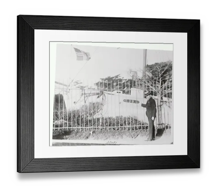 Framed Print : Roald Amundsen Standing by Boat