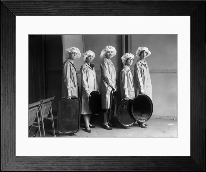 Framed Print : Portrait of woman holding trays Framed Print : Portrait of woman holding trays