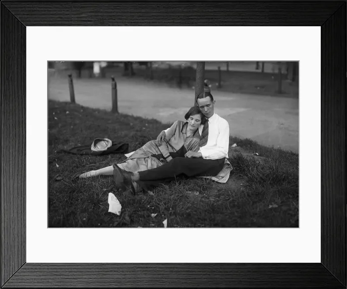Framed Print : Young couple resting in park Framed Print : Young couple resting in park