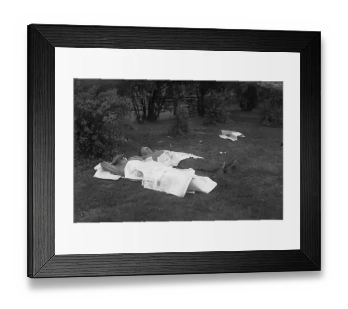 Framed Print : Two man sleeping in park covered with newspapers