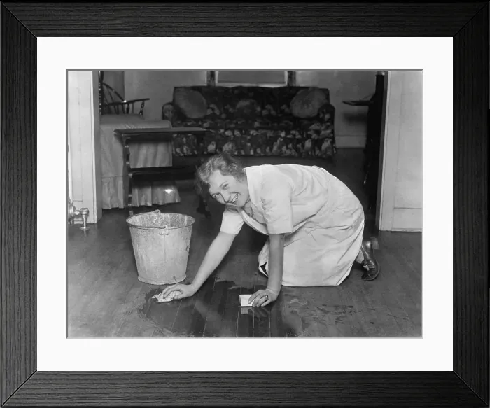 Framed Print : Smiling Housewife Scrubbing Floor Framed Print : Smiling Housewife Scrubbing Floor