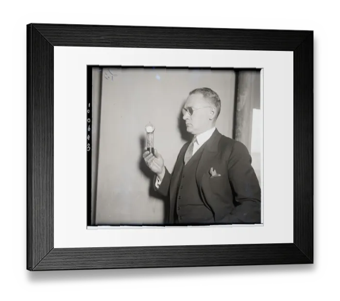 Framed Print : Scientist with Tube Which Controls Electric Current Framed Print : Scientist with Tube Which Controls Electric Current